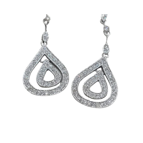 Boucles d'oreilles Boucles d'oreilles en or blanc 18 carats serties de diamants 58 Facettes PE248