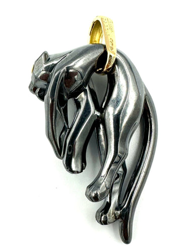 Pendentif CARTIER. Collection "Panthère", pendentif or jaune et silverium 58 Facettes