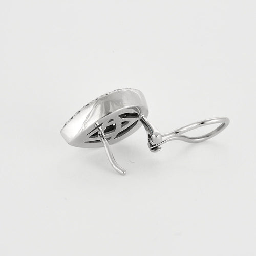 Boucles d'oreilles Boucles d'oreilles en or blanc, diamants et topaze bleue 58 Facettes LJ27