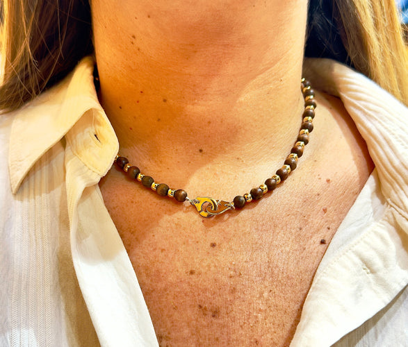 Collier Collier Dinh Van en or jaune 18 carats et boule de bois 58 Facettes