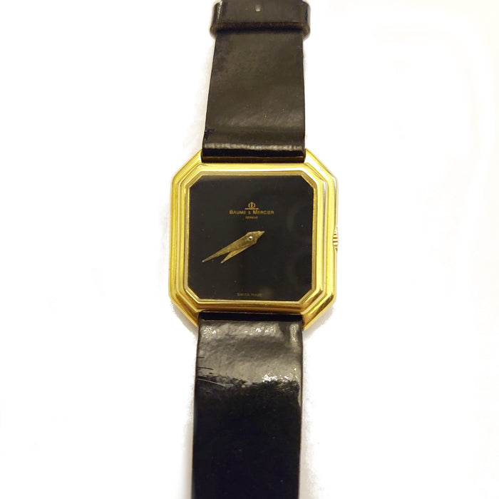 Montre BAUME ET MERCIER - Montre or jaune 58 Facettes 87