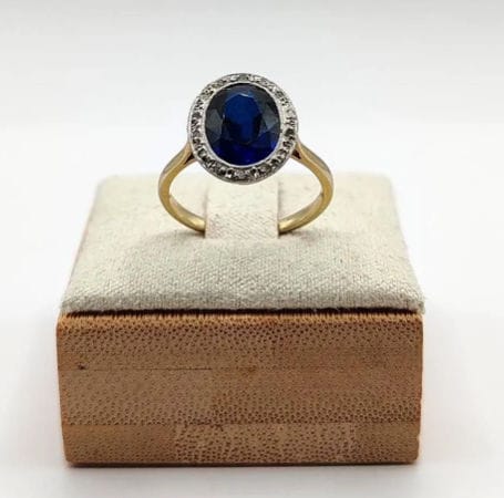 Bague 50.5 Bague Pompadour deux ors ornée d'une pierre bleue et de diamants 58 Facettes