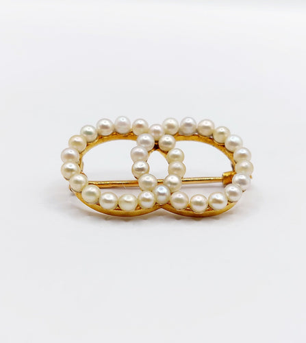 Broche Broche antique or jaune cercles infini et perles 58 Facettes A05616