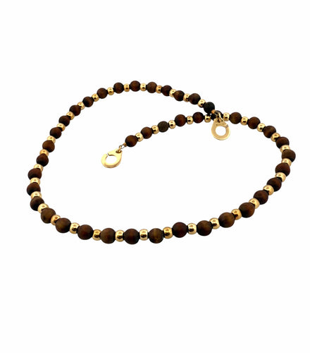 Collier Collier Dinh Van en or jaune 18 carats et boule de bois 58 Facettes