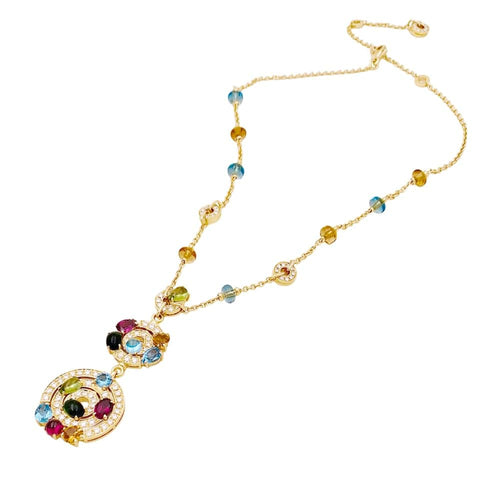 Collier Collier BULGARI "Astrale", or jaune, diamants et pierres de couleur. 58 Facettes 34838