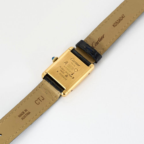 Montre Cartier - Montre Modèle "Tank Must" en argent, plaqué or et cadran bleu. 58 Facettes