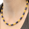 Collier Collier Lalaounis, or jaune, sodalites. 58 Facettes 34619