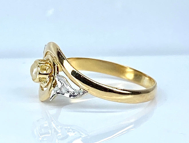 Bague 58 Bague en or jaune en perle et diamants sertis en or blanc 58 Facettes AB584