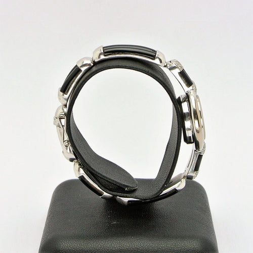 Montre Montre Chopard Genève en or blanc 18 carats avec onyx et diamants 58 Facettes