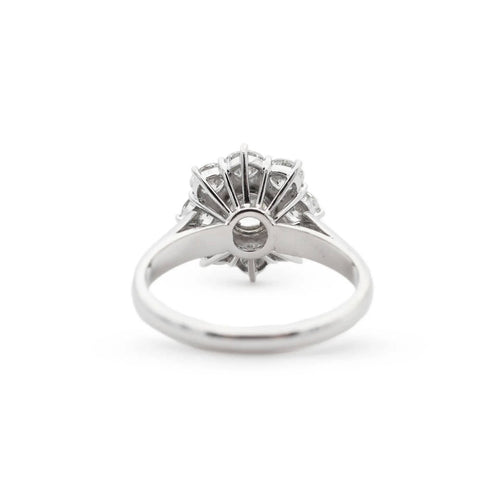 Bague Bague en or blanc avec un diamant central de 0,58 ct et des diamants d'accompagnement 58 Facettes 17694