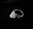 Bague 54.5 Bague or blanc sertie d'une perle blanche et diamants 58 Facettes