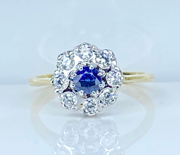 Bague 53 Bague marguerite en or, saphir et diamants 58 Facettes AB572