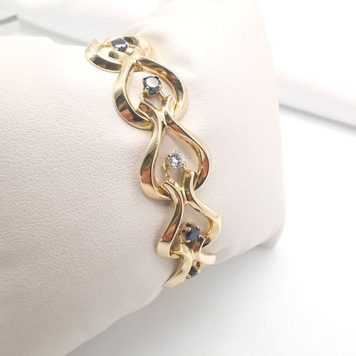 Bracelet Bracelet or jaune diamants et saphirs 58 Facettes