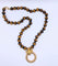 Collier Collier 70s' en or et oeil-de-tigre 58 Facettes