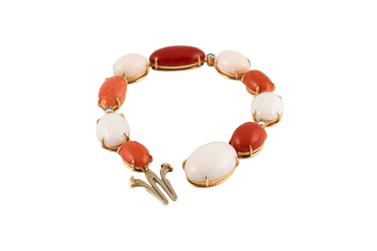 Bracelet Bracelet corail rouge et rose pale 58 Facettes 175328