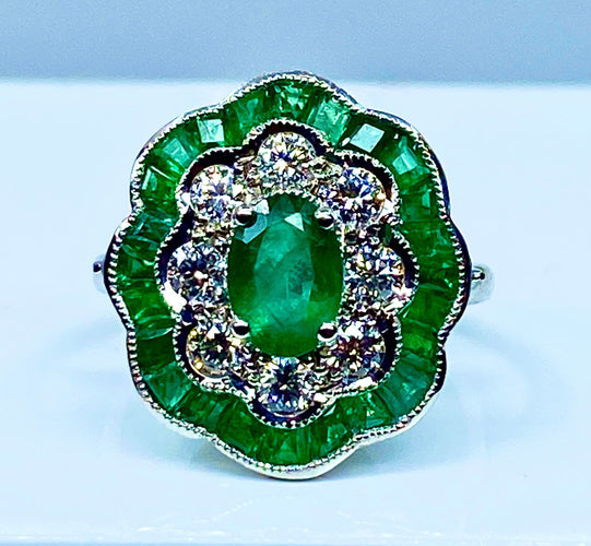 Bague Bague marguerite en or blanc 18 carats en émeraudes et diamants 58 Facettes AB216