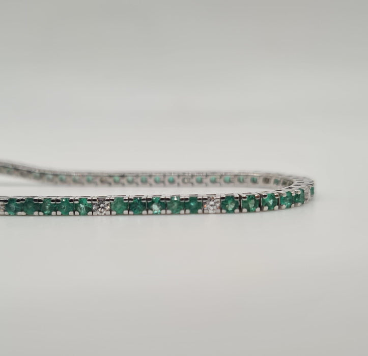 Bracelet Rivière or blanc sertie de diamants et émeraudes 58 Facettes