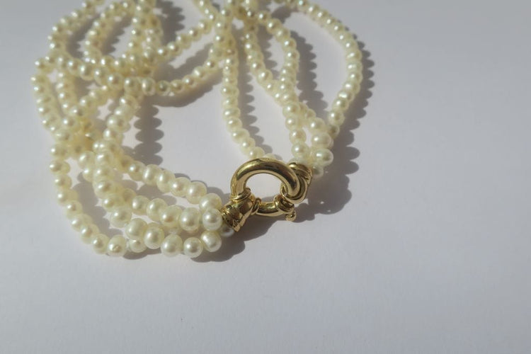 Bracelet Bracelet quatre rangs perles de culture 58 Facettes