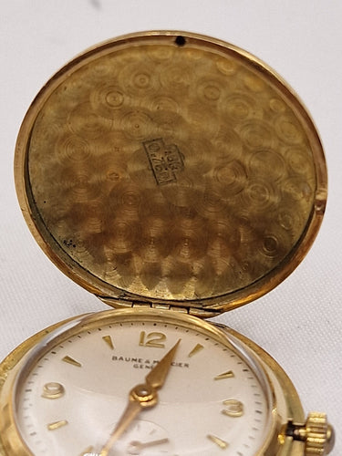 Montre Baume & Mercier - Broche montre émail en or jaune 18k 58 Facettes