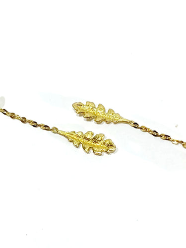 Boucles d'oreilles Paire de boucle d'oreille pendants feuilles en or 58 Facettes 3483