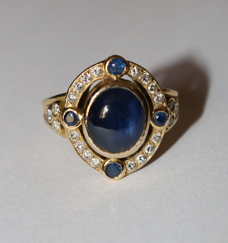 Bague 51.5 Bague or jaune, cabochon de saphir et diamants 58 Facettes 589