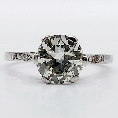 Bague 48 Bague solitaire art déco, platine et diamants 58 Facettes A05538