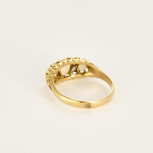 Bague 58 Bague type jarretière en or jaune, opales et diamants roses 58 Facettes MAR0975