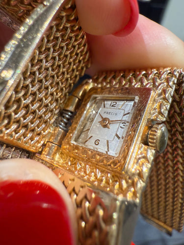 Montre Bracelet Montre Ruban Tressé - Or jaune et Diamants 58 Facettes 1.0000912/1