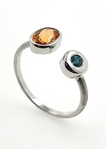 Bague 54 Bague en or blanc avec grenat spessartite et diamant bleu 58 Facettes 19062291