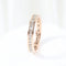 Bague Alliance en or rose sertie de diamants taille princesse 58 Facettes J020000096