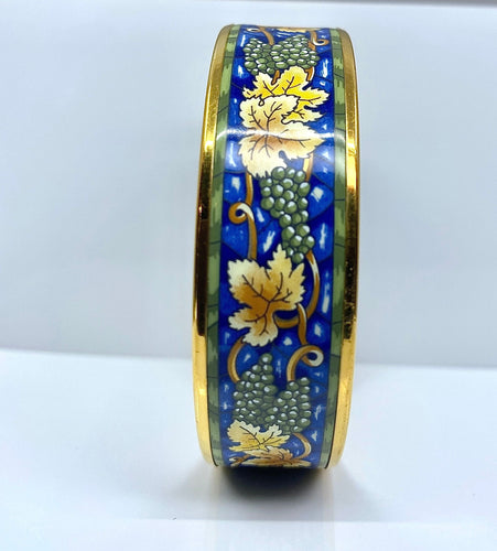 Bracelet HERMÈS - bracelet en métal doré et émail 58 Facettes AB657