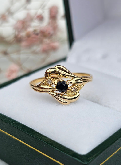 Yellow gold sapphire diamond ring
