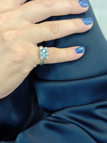 Bague Bague design en or avec topaze bleue et diamants 58 Facettes AO-0003