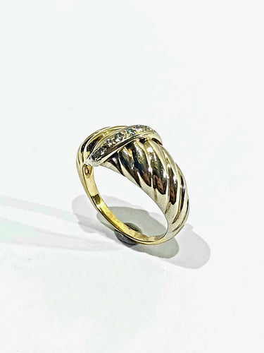 Anel de ouro bicolor com 7 diamantes