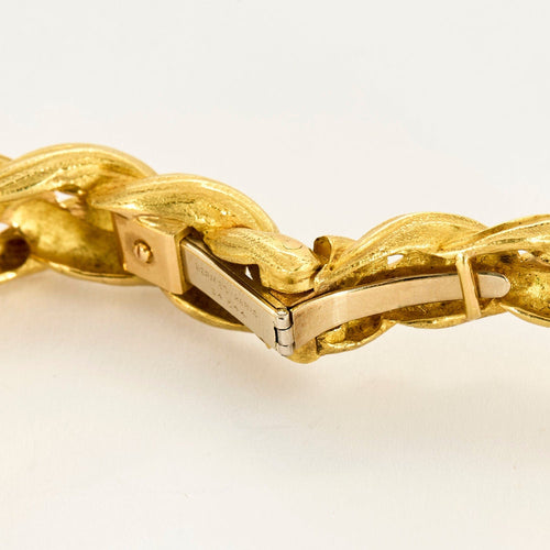 HERMES - Pulseira rígida em ouro amarelo com motivo de cavalo 