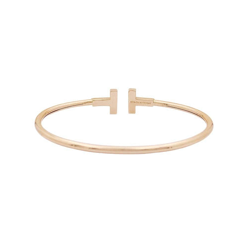 Bracelet Bracelet Tiffany & Co, "Wire Tiffany T", or rose et diamants. 58 Facettes 34924