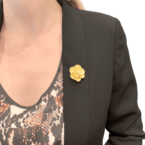 Broche Broche fleur en or jaune et diamants. 34685 58 Facettes 34685