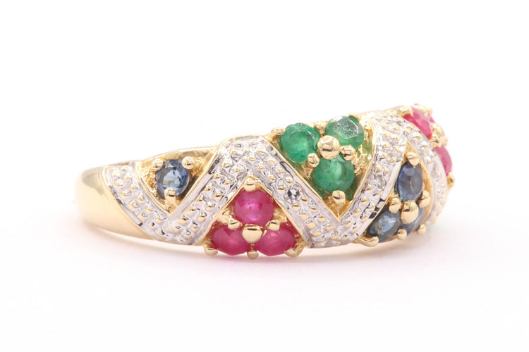 Bague 54 Bague en or jaune et blanc sertie de saphirs, rubis, émeraudes et diamants 58 Facettes B401