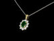 Pendentif Pendentif en or avec une émeraude ovale verte et des diamants naturels 58 Facettes 2369