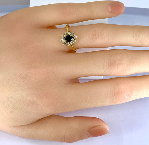 Bague 54 Bague marguerite en or jaune 18 carats, saphir et diamants 58 Facettes AB529