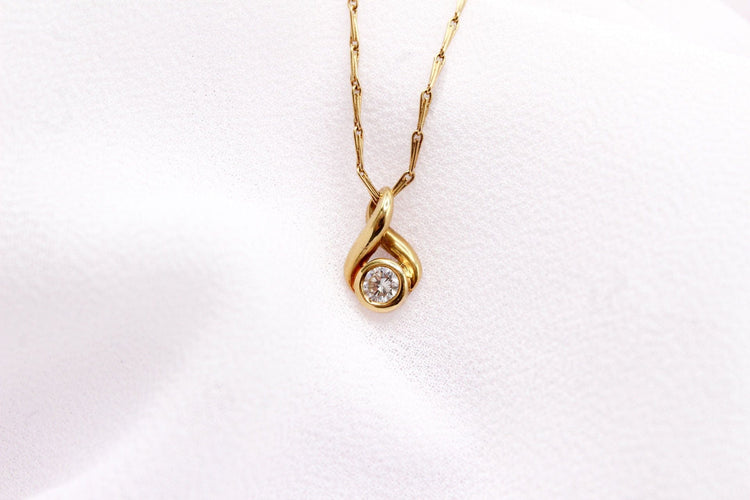 Pendentif Pendentif boucle or jaune diamant 58 Facettes 250437