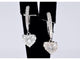 Boucles d'oreilles Boucles d'oreilles en or blanc serties de diamants en forme de cœur 58 Facettes 2174