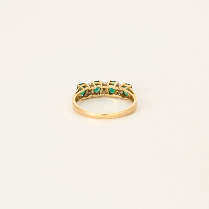 Yellow gold emerald river ring