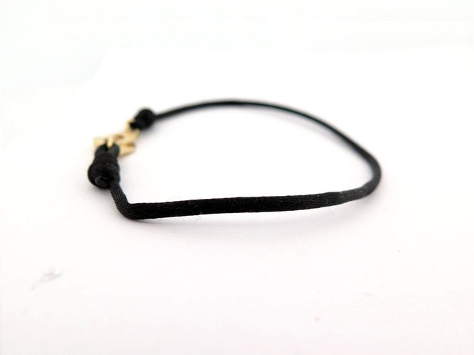 Bracelet bracelet DINH VAN menottes r10 341102 en or jaune 18k 2.9gr & cordon noir 58 Facettes 270151
