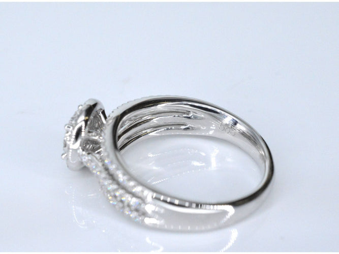 Bague 54 Bague entourage en or blanc avec diamants 58 Facettes 2009