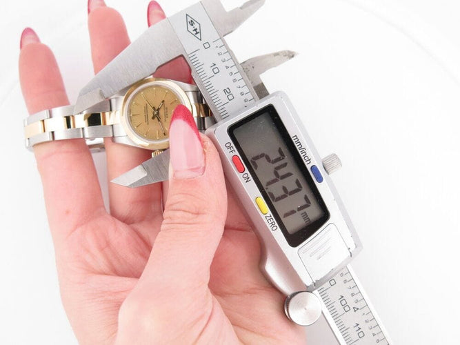 Montre vintage montre ROLEX 76183 oyster perpetual lady or & acier garantie auto 58 Facettes 265437