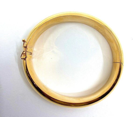 Bracelet Bracelet jonc en or 18 carats ouvrant, modèle lisse. 58 Facettes