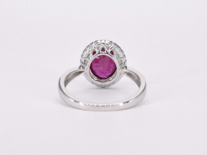 Bague 54 Bague entourage en or blanc avec diamants et rubis 58 Facettes 2060