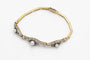 Bracelet Bracelet Art Déco avec diamants, perles et saphirs synthétiques en or jaune et platine 58 Facettes 9530