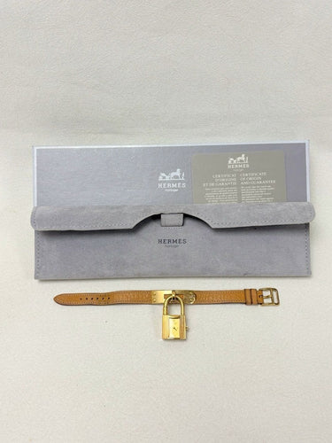 Montre Hermès - Montre Kelly en plaqué or, bracelet cuir camel 58 Facettes WC-2025-2302